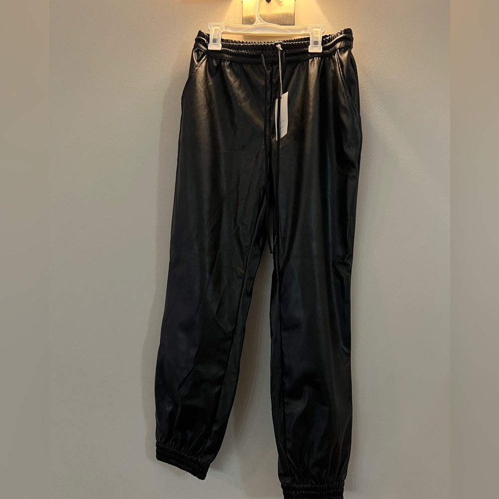 Brand new with tags!! Faux leather pants !!XS